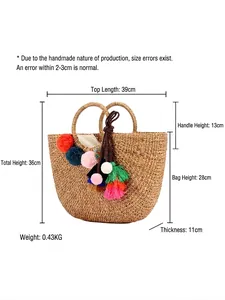 Handmade straw bag with colorful pom-poms featuring precise 39x28x11cm dimensions