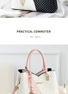 Detail of PU leather tote with monogram print and golden leaf and pearl charms