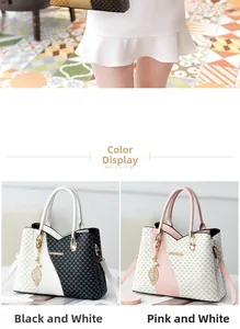Detail of monogram tote bag with gold lettering and adjustable shoulder strap