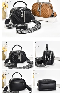 Detail of quilted crossbody bag with three zipper compartments and wide woven shoulder strap