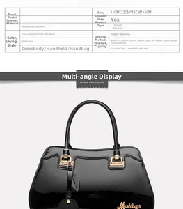 Macro shot of glossy black patent leather handbag with premium gold hardware detail