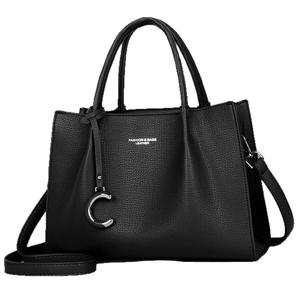 Large black lychee pattern leather tote bag with top handles and adjustable strap