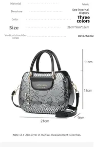Detailed size chart for faux snake skin tote bag with removable strap and cat charm