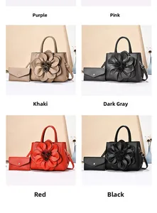 Fashion handbag set with decorative flower and matching wallet in multiple colors