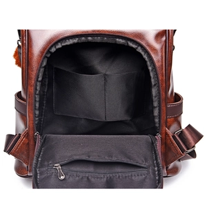 Brown soft PU leather backpack for women with large capacity and organized interior pockets