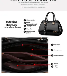 Detail view showing multi-pocket interior structure of shiny black leather handbag