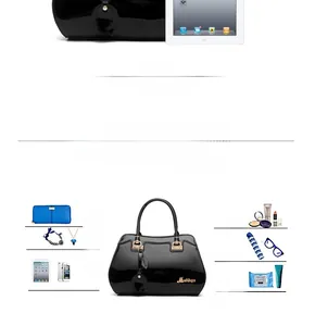Detailed internal view of black patent leather tote bag showing large storage capacity