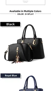 Detail view of 2-in-1 black and royal blue PU leather handbag set with cat charm