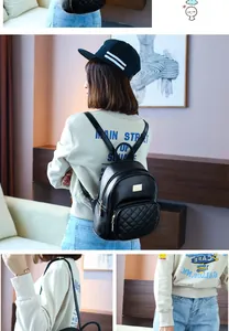 Dettaglio dello zaino mini in pelle trapuntata nera con cerniera dorata e logo in metallo