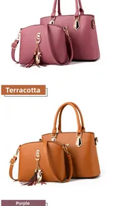 Detailed view of two-piece handbag set in purple and mustard yellow textured faux leather
