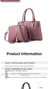 Detail of purple tote bag set with gold hardware, cat charm and size specifications