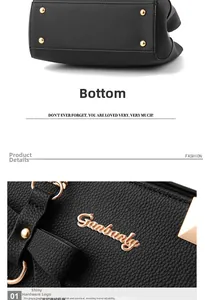 Detail of black lychee grain leather bag with golden feet and Ganbanly logo hardware