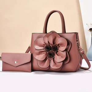 Pink floral faux leather handbag set with matching envelope wallet and gold hardware