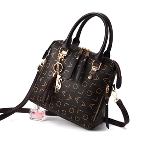 Fashionable dark coffee handbag with golden alphabet print and cute cat charm