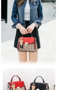 Detail of color-block flap bag with letter print and decorative teddy bear charm