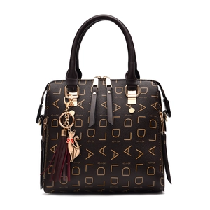Fashionable dark brown handbag with letter pattern, gold hardware and tassel cat charm