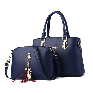 Navy blue two-piece handbag set with lychee grain leather and elegant cat pendant charm