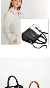 Close-up of quilted leather handbag with metal buckle and detachable shoulder strap