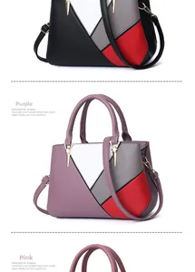 Detail view of multicolored patchwork leather tote bag with metallic hardware and strap