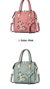 Detailed embroidery flowers on pink and green PU leather handbags with floral charms