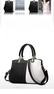 Detail of black woven texture and white leather patchwork on tote bag with gold hardware
