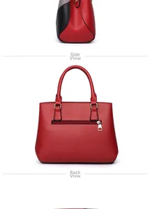 Detail view of red lychee grain handbag with back zipper pocket and gold hardware