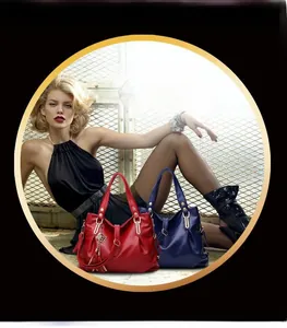 Detail of soft leather handbags in red and blue featuring stylish tassels and top zippers