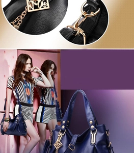Detailed macro view of gold-tone zipper hardware and geometric pendant on soft leather tote