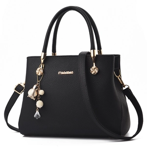 Classic black lychee pattern leather handbag for women with elegant golden hardware
