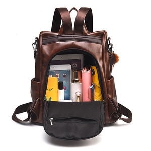 Brown vintage faux leather backpack with anti-theft design showing large storage capacity