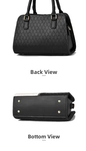 Detail view of the diamond grid texture and protective metal rivets on the black handbag