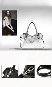 Detailed view of genuine sheepskin texture and luxury metal hardware on a black handbag