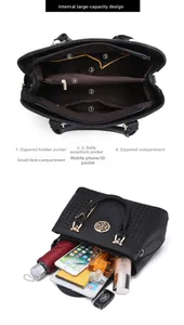 Detailed interior view of a black tote bag showing large capacity and functional pockets