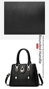 Détail d'un sac à main en cuir noir grainé avec ferrures dorées et poignée confortable