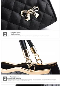 Detail der schwarzen Stepptasche mit goldener Metallschleife und kettenverstärktem Griff