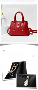 Détail de la texture du cuir et des ferrures dorées polies sur un sac à main élégant