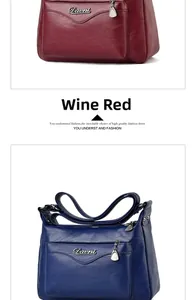 Detail of red and blue soft leather handbags with litchi texture and metal hardware