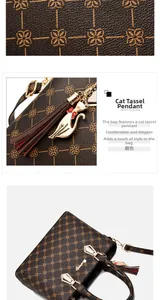 Detail of dark brown leather tote with gold clover pattern and cat tassel charm