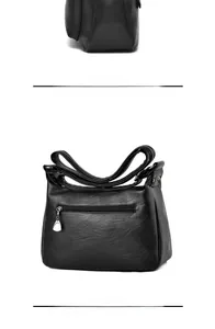 Detail of black pebbled leather handbag featuring a secure back zipper pocket and metal slider