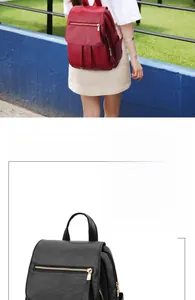 Detail of red and black pebble leather backpacks with flap and drawstring closure