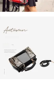 Macro view of patent leather handbag featuring intricate gold embossed floral patterns