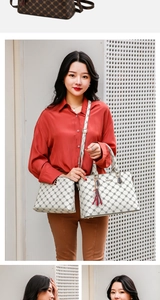 Detail of cross-pattern tote bag set with metal tassel charm on female model