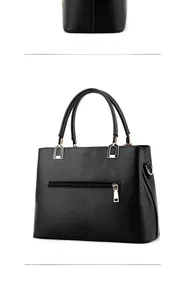 Detail view showing black lychee grain faux leather handbag side and rear zip pocket