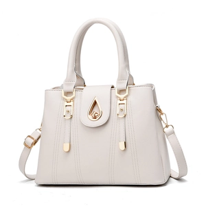 Sac à main blanc en simili cuir avec détails dorés et coutures verticales élégantes