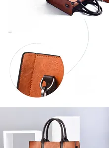 Detail shot of precision reinforced stitching and silver buckle on brown vintage leather bag