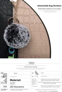 Detail view of stone pattern handbag with dimensions 28x13x18cm and faux fur charm
