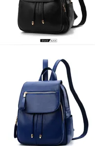 Detail view of the black soft leather backpack with flap closure and decorative tassels