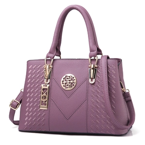 Purple lychee grain leather handbag with gold metal hardware and V-stitch pattern