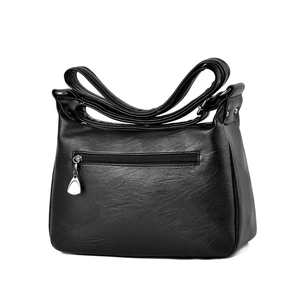 Classic black leather shoulder bag with textured finish and adjustable strap for women