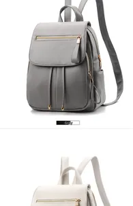 Vertical view of the gray and beige PU leather backpacks with zipper front pockets